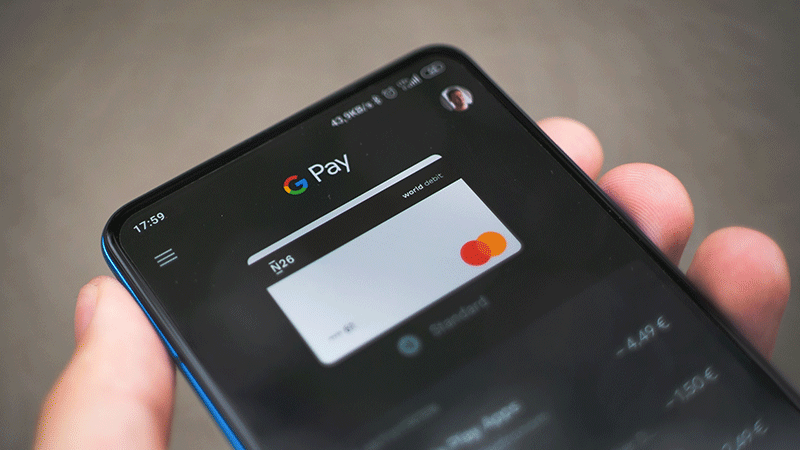 G pay logo on mobile phone screen