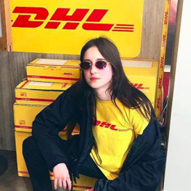 Woman wearing a DHL T-shirt