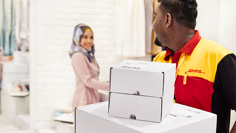 DHL courier handling parcel