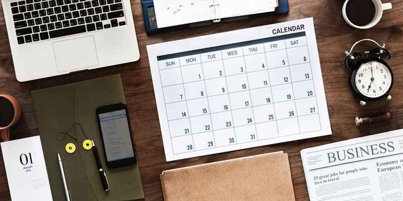 calendar and stationery items on a table