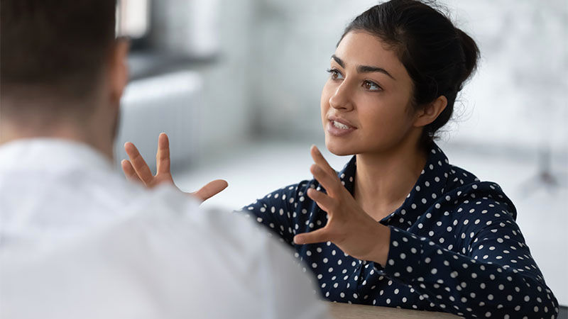 woman talking to a man