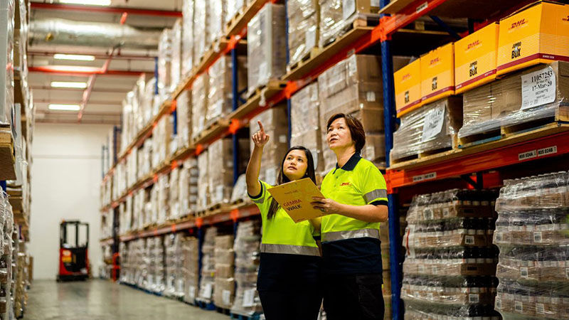 two people in a warehouse