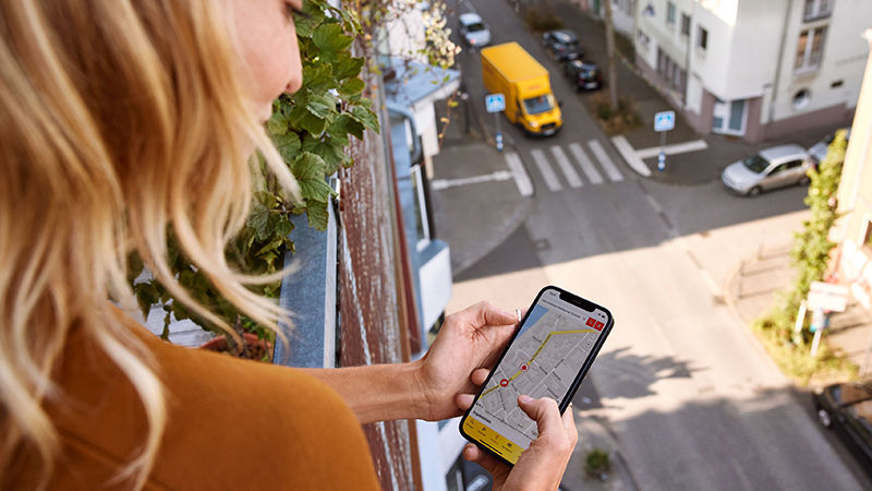 woman holding a mobile phone