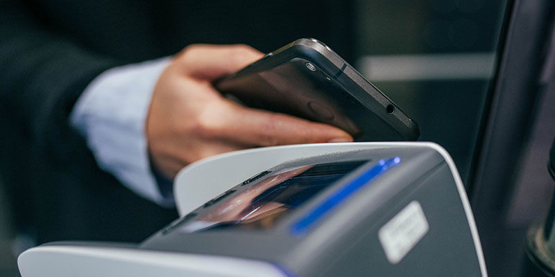 mobile phone being used for contactless payment