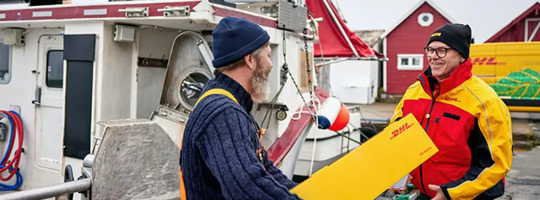 DHL courier handing a man a parcel