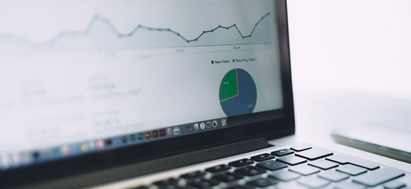 Laptop with close up of graphs