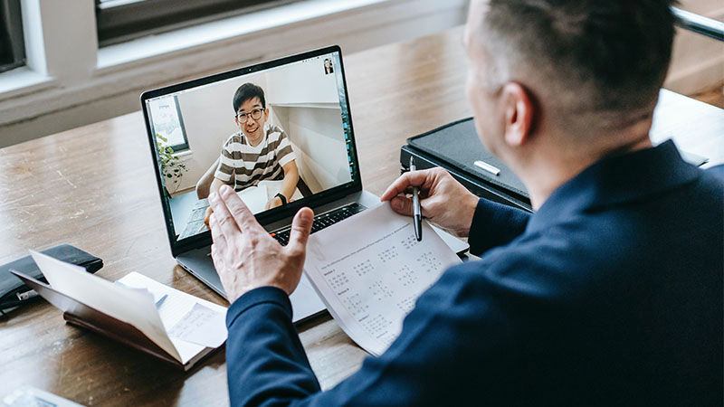 man looking at laptop screen