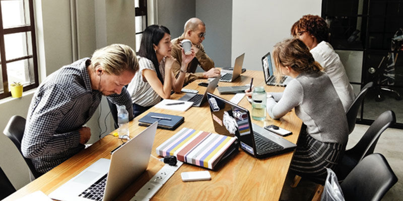 people looking computer screens