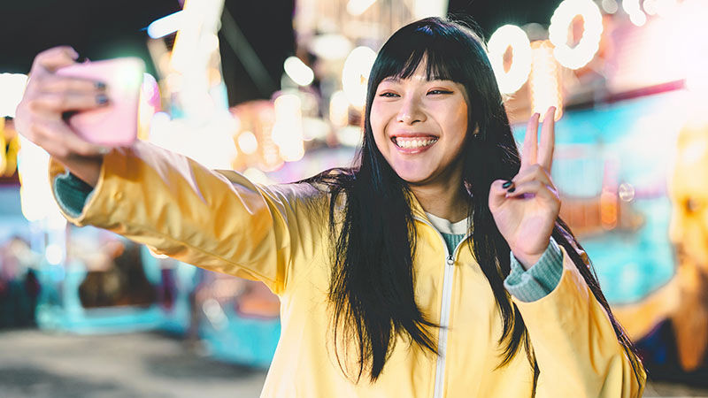 Chinese woman taking a selfie