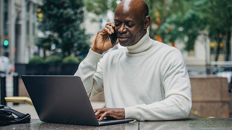 man holding mobile phone