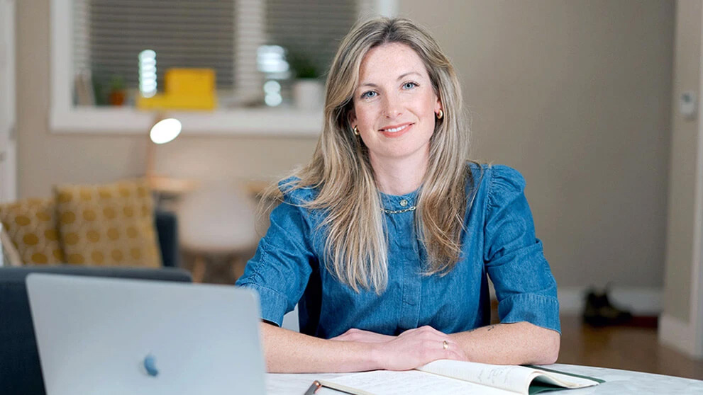 Business woman sitting at her desk