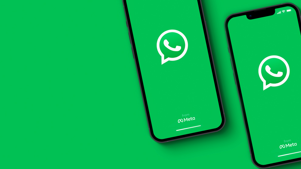 WhatsApp logo on two mobile phone screens