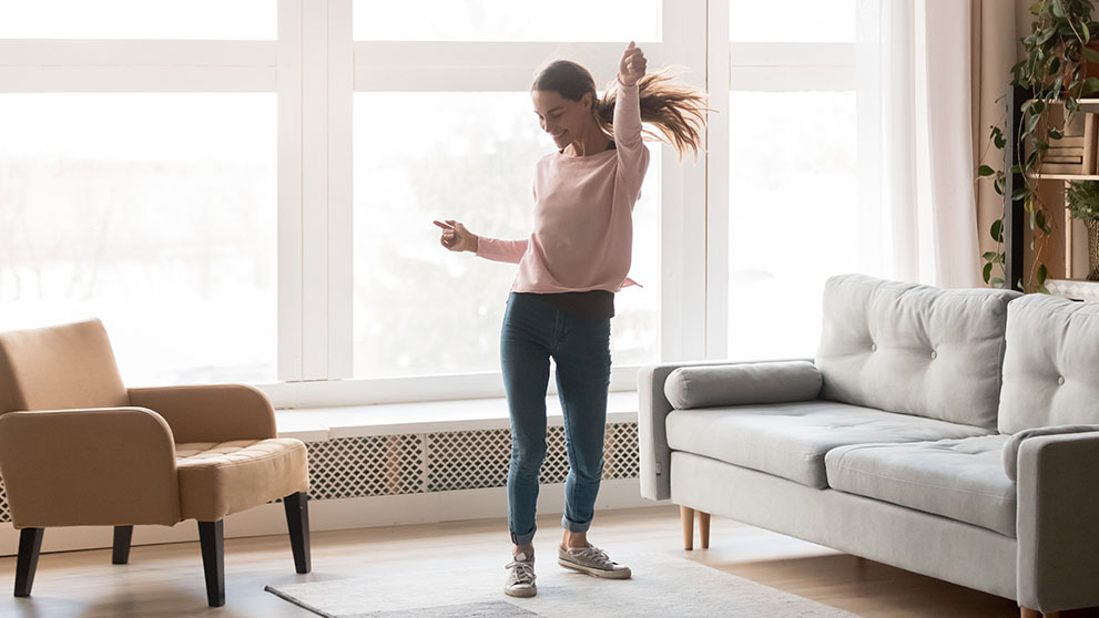 woman dancing in a living room