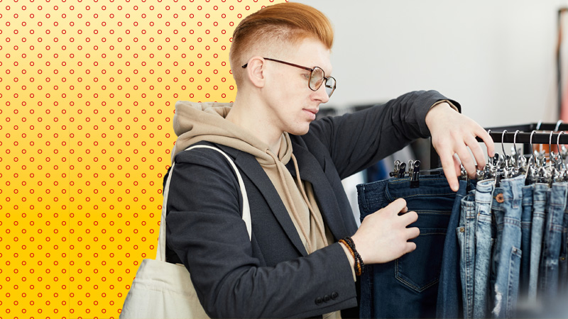 person browsing clothes rail