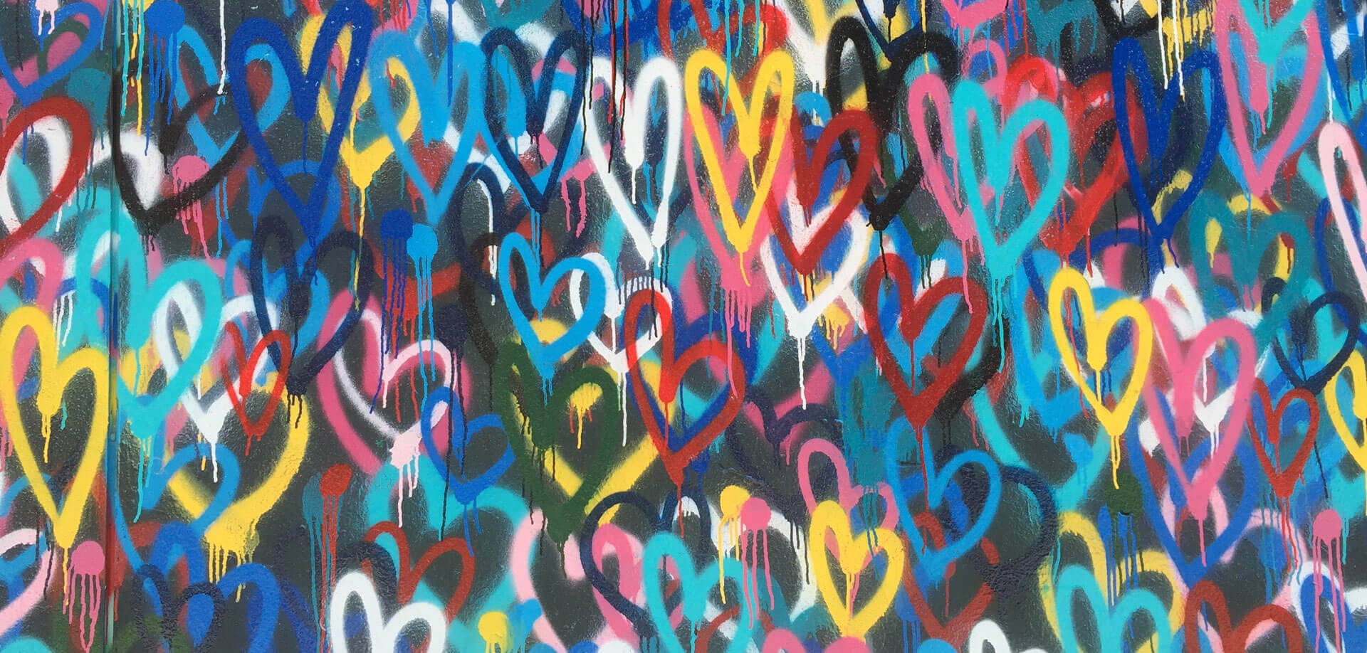 image of wall with hearts spray-painted 