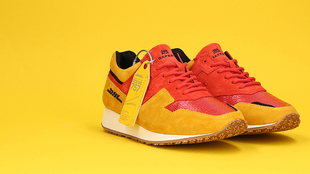 yellow and red DHL branded trainers