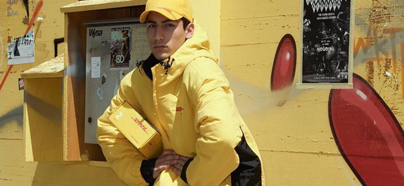 Man wearing a yellow DHL jacket