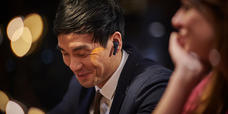 Man with Mobvoi wireless earphones 