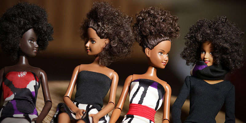 4 Malaville dolls in black, white and red outfits