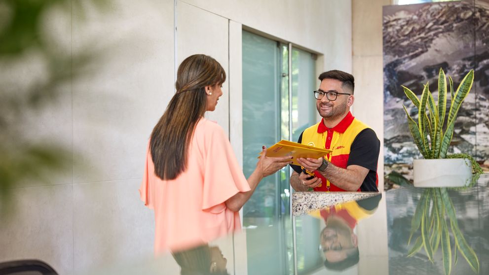  dhl express employee delivering transcripts to a university