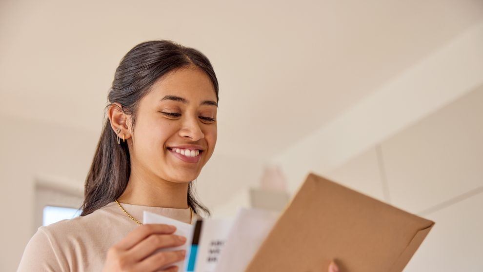 female business owner preparing documents for shipment declaration