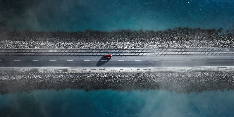 birds eye view of a car on a road