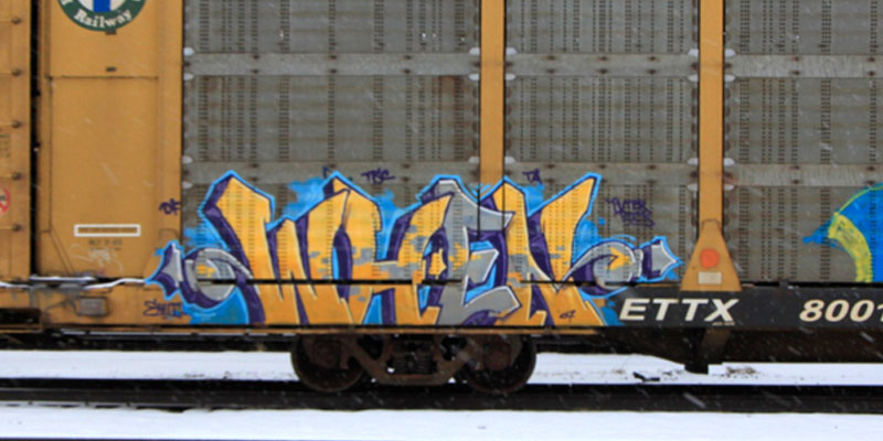 Graffiti on the side of a train
